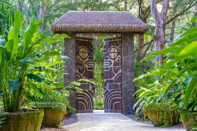 A garden with a gazebo in the middle of it